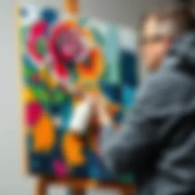 Final Touches on Oil Artwork An artist applying final touches to a colorful oil painting