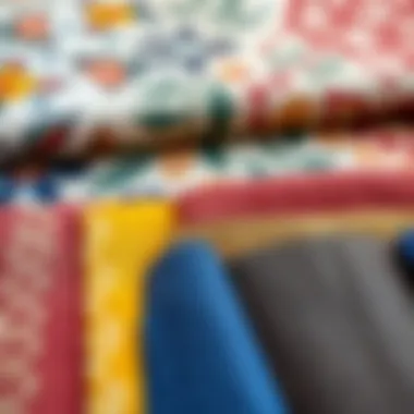 Selection of fabric samples and wallpaper swatches for room decor