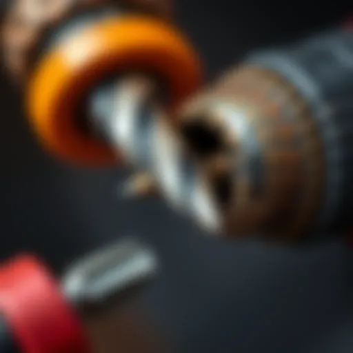 Close-up of a drill bit being removed from a drill