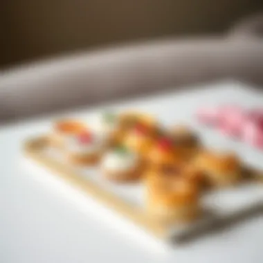 Sleek presentation of mini pastries on a stylish serving tray