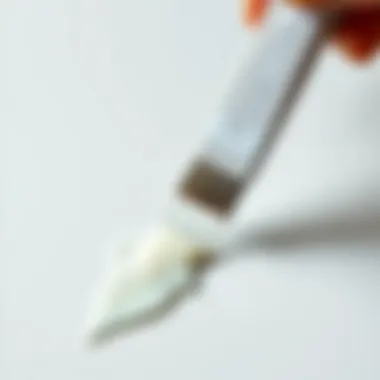 Scraping Techniques for Adhesive Removal Scraping off dried adhesive with a plastic tool