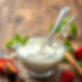 A bowl of fresh yogurt with a spoon