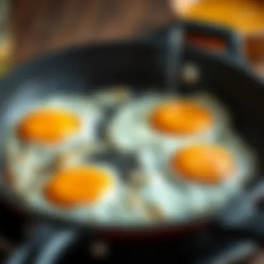 Fried eggs sizzling in a skillet